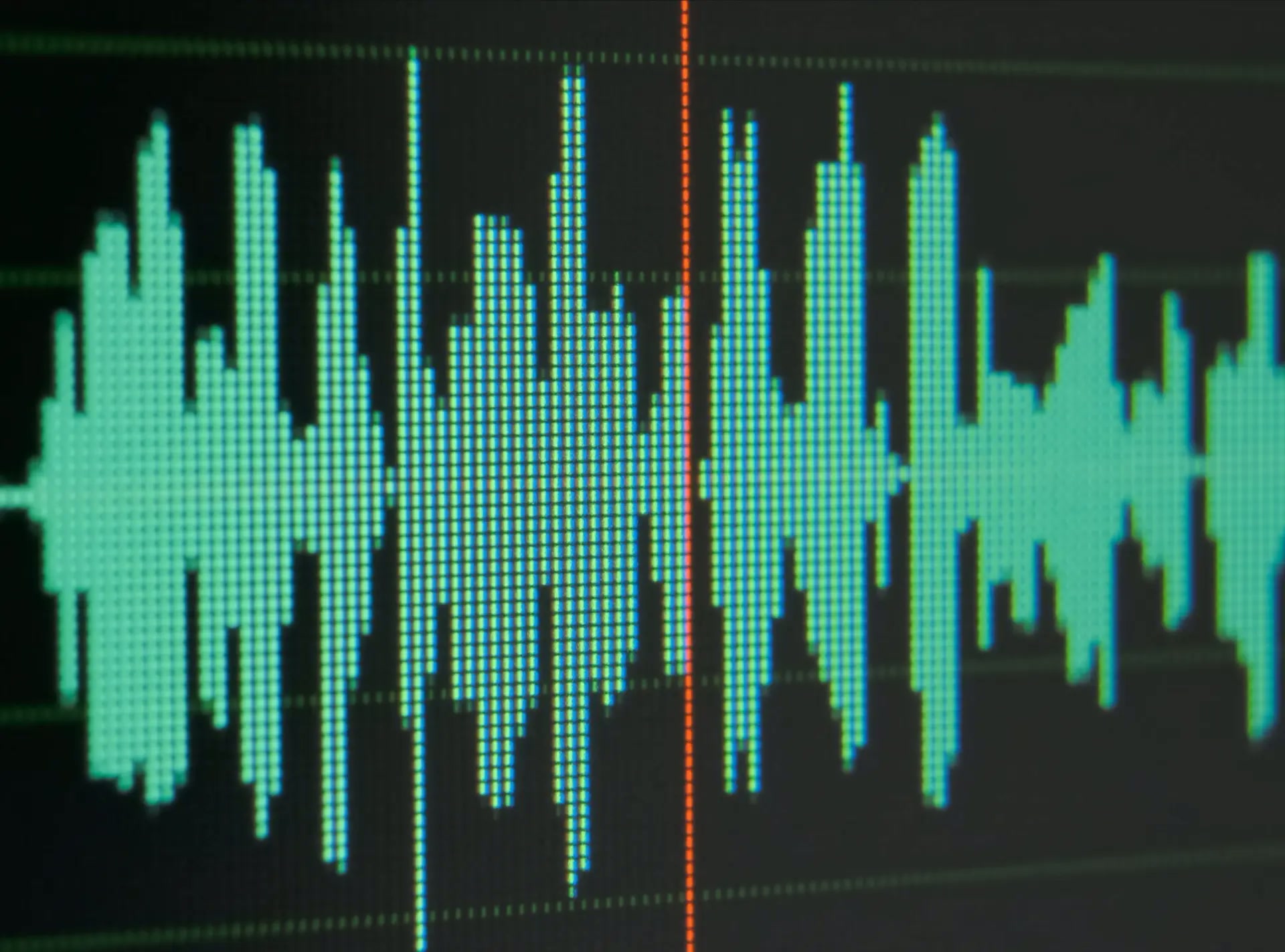 Audio waveform on a monitor in the Tales Of The Cool audio post-production suite