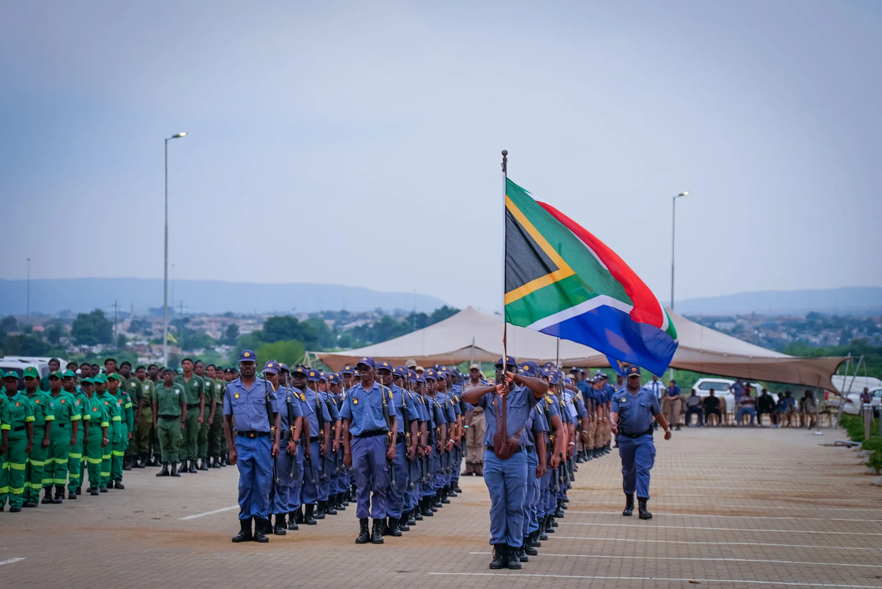 Ceremonial march with the South African flag
