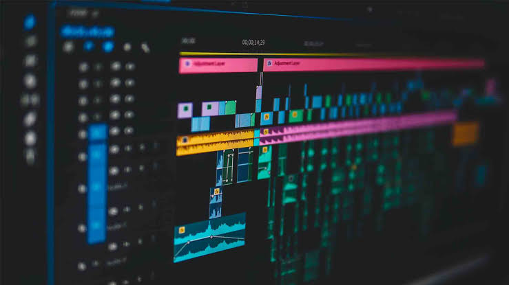 Editing timeline on a monitor in a Tales Of The Cool post-production suite