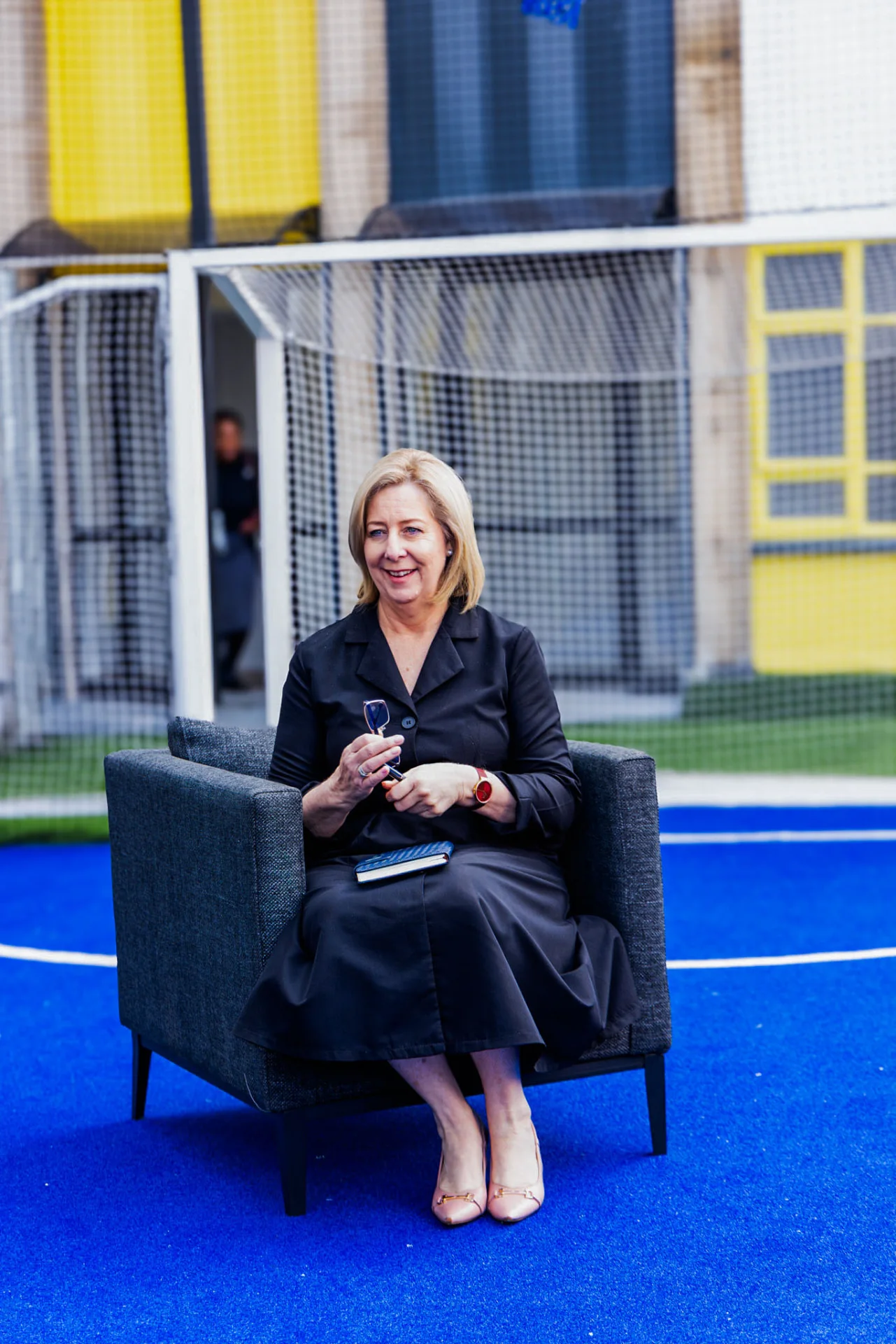 Ms Annette Lindeque smiling during the interview on the rooftop court.