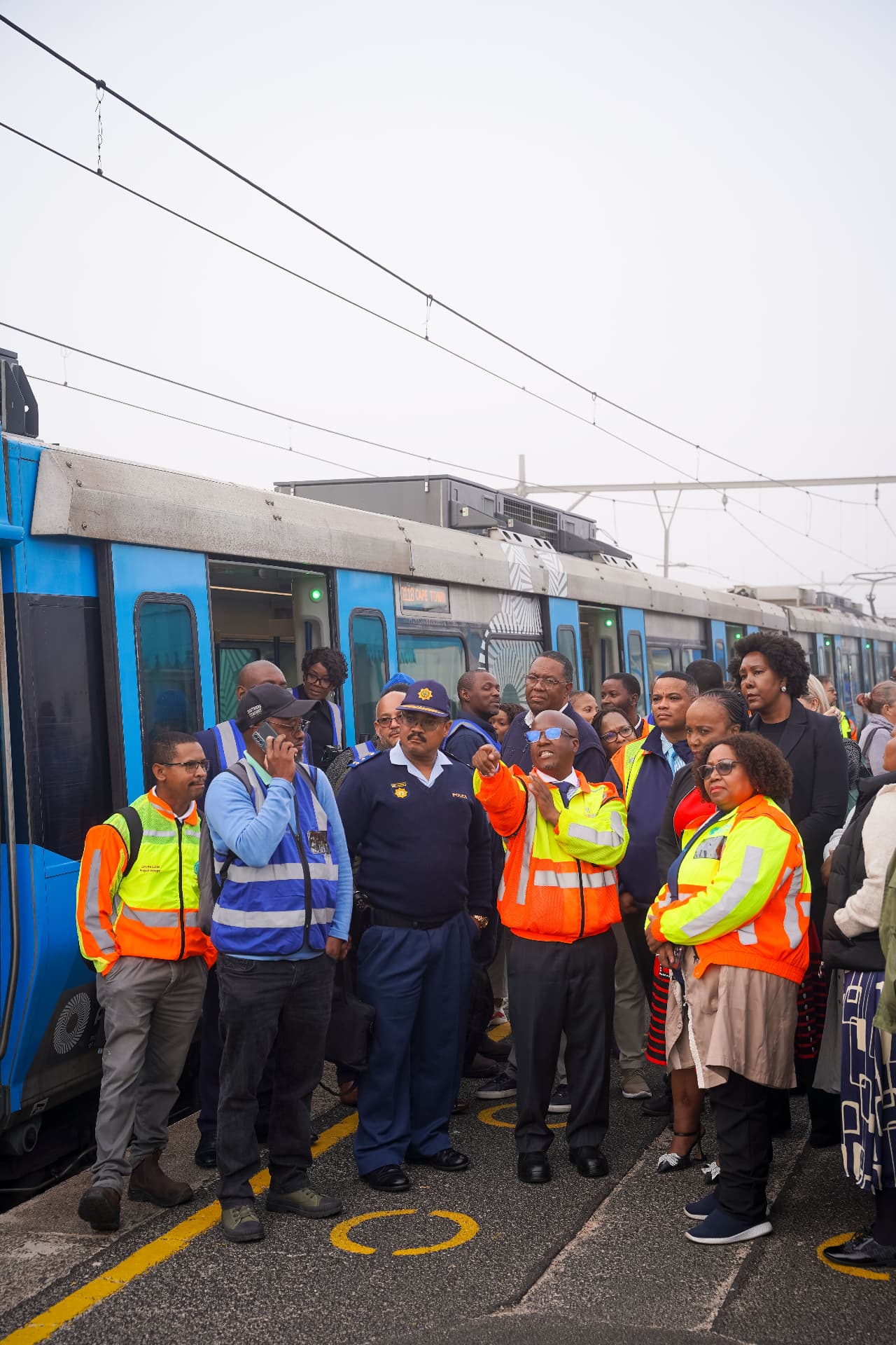 Train Set #200 — delegation beside the train